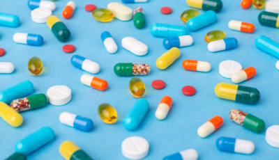 Background of different colorful pills and capsules