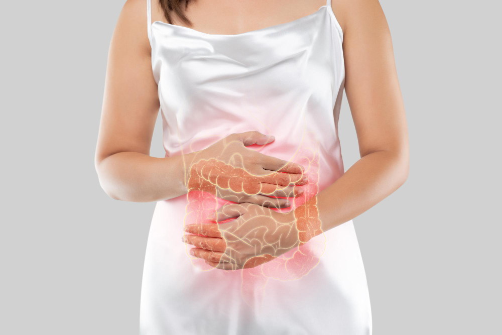 The photo of large intestine is on the woman's body, isolate on white background, Femal
